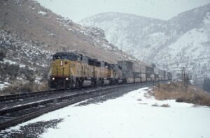 Union Pacific Railroad | Lava Hot Springs, Idaho | GE C44AC #6250, C44ACM #6055 and EMD SD40-2 #3448 diesel-electric locomotives | freight service | January 9, 1994 | Dick Flock photograph / collection