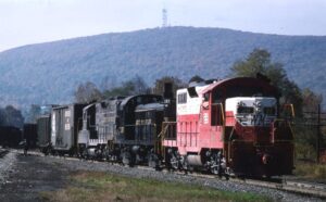 Western Maryland Railway | Cumberland, Maryland | EMD GP9 #28, Alco RS3 #187 + EMD GP9 diesel-electric locomotives | freight service | October 1974 | Bill Barr photograph / collection