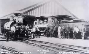 Boston and Maine Railroad | Boston, Massachusetts | Class 4-4-0 #163 PRIDES Steam locomotive + 1 | 1872 | Eastern Railroad shops photograph