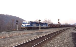 Conrail | Sewickley, Pennsylvania | EMD SD80MAC #4110 and #4124 diesel-electric locomotives | Empty hopper train | November 21, 1997 | Dick Flock photograph / collection