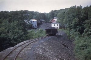 East Broad Top Railroad | Joller, Pennsylvania | Coles Valley Branch | hopper car and buildings | June 6, 1946 | Bill Rugen photograph | North Jersey Chapter, NRHS Collection
