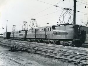 Pennsylvania Railroad | Camden, New Jersey | GE GG1 #4808 and Altoona Works GG1 #4826 + caboose | December 5, 1953 | R.L. Long Photograph | West Jersey Chapter, NRHS Collection