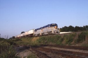 Delaware and Hudson Railway | Roselle Park, New Jersey | on Conrail, ex Lehigh Valley | EMD GP38-2 #7304 and #7307 diesel-electric locomotives | DH765 westbound | August 7, 1992 | Carl Perelman photograph | Frank Etzel collection