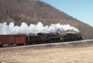 East Broad Top Railroad | Shirley Township, Pennsylvania | Baldwin Class 2-8-2 #14 and #17 narrow gauge steam locomotives | Northbound photo freight special | February 1976 | Jack de Rosett photograph | Morning Sun Books Collection