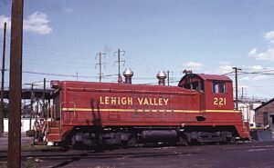 Lehigh Valley Railroad | Newark, New Jersey | EMD SW8 #221 diesel-electric locomotive | Oak Island Yard | September 1975 | Jackl de Rosset photograph | Morning Sun Books collection