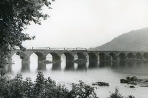 Amtrak | on Penn Central Transportation | Rockville, Pennsylvania | EMD SDP40 diesel-electric locomotive | Broadway Limited | Rockville Bridge | August 1974 | Ed Kaspriske photograph / collection