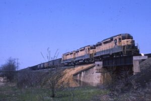 Reading Company | Mount Holly Springs, Pennsylvania | EMD GP30 #5516 + 2 diesel-electric locomotives | AJ1 Freight | March 1964 | Al Holtz photograph / collection