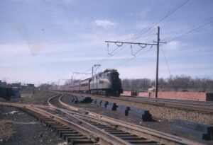 Pennsylvania Railroad | Washington, D.C. | Altoona Works Class GG1 no number detected | Eastbound Passenger Train | 1952 | Henry Libby photograph / collection
