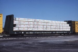 British Columbia Railway | Willard, Ohio | on B&O | Bulkhead flat lumber car #866283 | September 19, 1986 | Emory Gulash photograph | Stephen Timko collection
