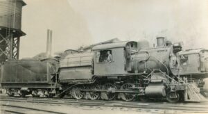 Central Railroad of New Jersey | Brooks Class 2-8-0 #450 Camelback steam locomotive | Elizabethport, New Jersey | April 1903 | Central Railroad of New Jersey Staff photographer | Warren Crater, Friends of the New Jersey Transportation Museum Collection