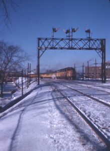 Chicago and Northwestern Railroad | Evanston, Illinois | EMC E3a #5001A-#5001B diesel-electric locomotives | Train 214 | Semaphore Signal Tower | 1949 | Henry Libby photograph / collection