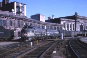 New York Central System | Albany, New York | EMD E8a #4047 + 1 diesel-electric locomotives | Albany Train Station | New York City bound passenger train | April 5, 1964 | Matt Herson photograph | Mitchell E. Dakelman collection