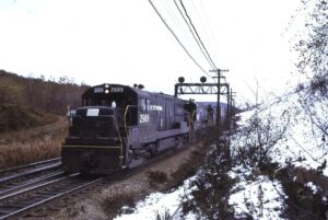 Penn Central Transportation Company | Tunnel Hill, Pennsylvania | aka Gallitzin, Pa. | GE U25B #2609, #2626 + 1 diesel-electric locomotives | westbound freight | October 1972 | Larry Steingarten photograph / collection