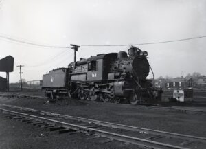 Central Railroad of New Jersey | Raritan, New Jersey | Class 4-6-0 #164 Camelback steam locomotive | February 24, 1952 | R.L. Long photograph | West Jersey Chapter, NRHS Collection