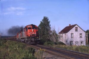 Canadian National Railway | Wellington, Nova Scotia, Canada | MLW C630M #2313 and M636 #2036 diesel-electric locomotives | Gypsum Train | August 30, 1987 | Carl Perelman photograph | Frank Etzel collection