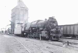Pennsylvania Railroad | Elmira, Pennsylvania | Juniata Works I1s class 2-10-0 steam locomotive | at coaling tower | May 31, 1952 | R. L. Long photograph | West Jersey Chapter, NRHS collection