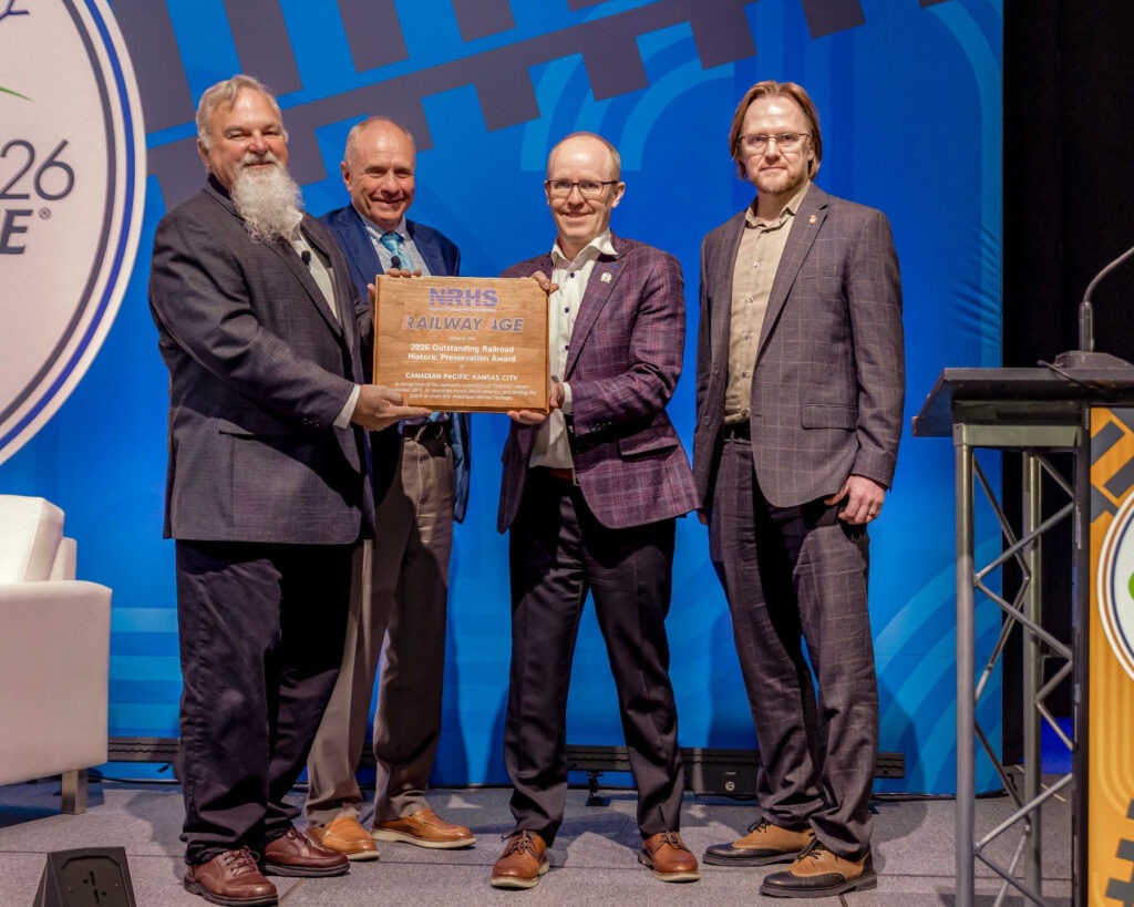 Left to right: Mike Yuhas, Director, NRHS; Jonathan Chalon, Publisher, Railway Age; James Clements, Executive Vice President, Strategic Planning & Corporate Services, CPKC; Adam Meeks, Director, Heritage Services & Operations, CPKC. Photo by Railway Interchange.
