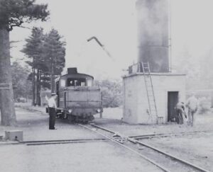 Edaville Railroad | South Carver, Massachusetts | Class 0-4-0T #3 steam locomotive | at water tower | 1960 | Kevin Mugridge photograph / collection