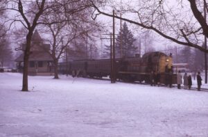 Erie Lackawanna Railway | Oradell, New Jersey | Alco class RS2 #909 diesel electric locomotive | commuter train at Passenger Station | January 1970 | Ken Kulick photograph / collection
