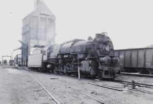 Pennsylvania Railroad | Elmira, New York | Class 2-10-0 #4489 steam locomotive | coaling tower | May 31, 1956 | R.L. Long photograph | West Jersey Chapter, NRHS collection