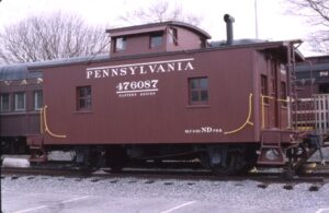 Pennsylvania Railroad | Strasburg, Pennsylvania | Restored ND Class #476087 bobber caboose | on Strasburg Railroad | March 24, 2006 | Dick Flock photograph / collection