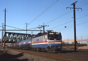 Amtrak | Newark, New Jersey | EMD AEM7 #953 electric motor | westbound passenger service | at Hunter | March 12, 1991 | Frank Etzel photograph / collection