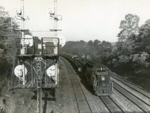 Central Railroad of New Jersey | Fanwood, New Jersey | EMD GP40PH-2 #3677 + Reading 4-8-4 2102 | Passenger excursion | Signal tower | May 27,1969 | Ed Kaspriske photograph / collection