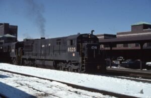 Conrail | Springfield, Massachusetts | GE U25V #6525 diesel-electric locomotive + 1 | Springfield Station | March 20,1977 |Joseph Snopek photograph | Mitchell E. Dakelman collection