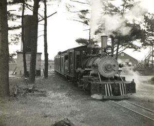 Edaville Railroad | South Carver, Massachusetts | Class 2-4-4RT #7 2-foot gauge steam locomotive | Passenger train | at tower | June 1951 | Fielding Lew Bowman photograph / collection
