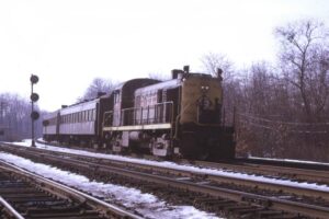 Erie Lackawanna Railway | Ridgewood, New Jersey | Alco RS3 #909 diesel-electric locomotive | westbound Commuter train | February 1970 | Ken Kulick photograph / collection