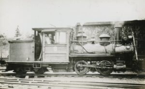Wiscasset, Waterville and Farmington Railroad | ex – Kennebec Central | Wiscasset, Maine | 1933 | Baldwin 2-foot gauge 0-4-4T steam locomotive | Derry Studios photograph | William McChesney collection