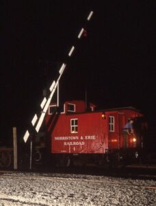 Morristown and Erie Railroad | Whippany, New Jersey | Wood sided bobber caboose #1 | Whippany Rail Museum collection | Night photograph | JCRHS Chapter, NRHS banquet activity | September 12, 1998 | Mitchell E. Dakelman photograph / collection