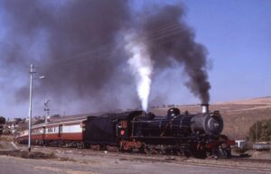 South African Railways | Potfontein, South Africa | 4-8-4 “Jennifer” steam locomotive | Steam Special | July 7, 1983 | Allan Miller photograph | Morning Sun Books collection