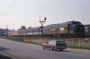 Amtrak | Lafayette, Indiana | EMD Penn Central E8a #4307 and B&O E8a diesel-electric locomotives | Amtrak passenger train | October 1971 | Ken Kulick photograph / collection