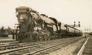 Central Railroad of New Jersey | Bayonne, New Jersey | Baldwin class G3 4-6-2 #833 steam locomotive | eastbound Blue Comet | at Eighth Street | 1935 | Railroad photographs | William McChesney collection