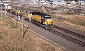 Chicago and Northwestern Railway | Grand Island, Nebraska | EMD GP50 #5094 + 2 Union Pacific GE diesel-electric locomotives | freight service | September 10, 1994 | Dick Flock photograph / collection
