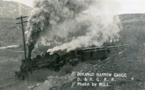Denver and Rio Grande Western Railroad | Durango, Colorado | Baldwin K-36 Class 2-8-2 #485 narrow gauge steam locomotive | Passenger Train | 1950 | Hill Photograph | William McChesney collection