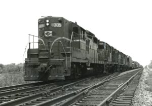 Lehigh Valley Railroad | Edison, New Jersey | EMD GP18 #305 + 4 diesel-electric locomotives | at Potters Interlocking Westbound | June 1971 | Ed Kaspriske photograph / collection