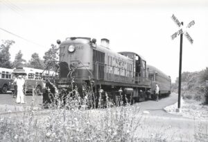 New York, New Haven and Hartford Railroad | Groton, Connecticut | Alco RS3 #560 diesel-electric locomotive | shifting Sea Wolf Special passenger coaches at Eastern Point Road | July 21, 1955 | Milton Paul Baline photograph | Henry Libby collection