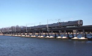 New Jersey Transit | Red Bank, New Jersey | GE-Budd electric MU set | Navesink River Bridge | Long Branch bound commuter train | March 12, 1991 | Frank Etzel photograph / collection