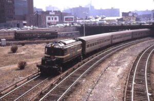 New York Central System | Mott Haven (Bronx), New York | GE T2b electric motor | westbound Albany bound train | March 1966 | Allen H. Roberts photograph | Mitchell E. Dakelman collection