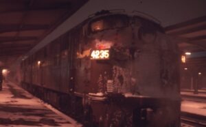 Penn Central Transportation Company | Buffalo, New York | EMD E7a #4235 + 1 diesel-electric locomotives | Night view at Buffalo Union Terminal | Buffalo Day Express | January 1969 | Ken Kulick photograph / collection