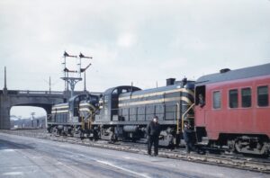 Central Railroad of New Jersey | Reading Company | Lehigh Valley Railroad | Bethlehem, Pennsylvania | Alco RS3 diesel-electric locomotives | Train 317 from Philadelphia dropping Lehigh Valley coach for LV Train 9 | March 1956 | Will Coxey photograph / collection