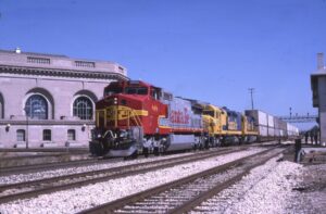 Atchison, Topeka and Sante Fe Railway | Joliet, Illinois | GE D8-40CW #848 + 2 diesel-electric locomotives | WB TV Train | July 29, 1995 | Joliet Passenger Station | July 1995 | Dick Flock photograph / collection