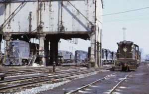 Central Railroad of New Jersey | Jersey City, New Jersey | Communipaw Engine Facility and Coaling Tower | with CRNJ and B&O diesel-electric locomotives | September 1969 | Ken Kulick photograph / collection