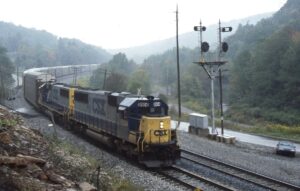CSX Transportation | Sand Patch, Pennsylvania | EMD SD50 #8504 + 1 diesel-electric locomotives | passing wayside railroad signal mast | Autorack train | September 17, 1994 | Dick Flock photograph / collection