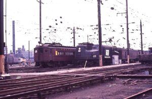Penn Central Transportation Company | Long Island City, New York | Sunnyside Yard | PRR MP54 MU car train | Altoona Works GG1 #4899 electric motor with train | December 1968 | Ken Kulick photograph / collection