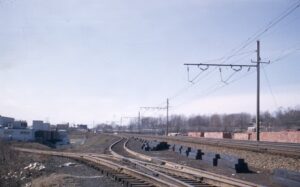Pennsylvania Railroad | Washington, D.C. | Right-of-way looking south west with yard tracks | overhead two-track catenary structure | 1954 | Henry Libby photograph / collection